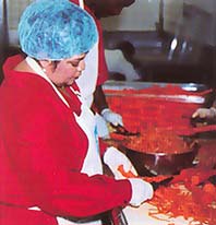 Nell Carter prepares meals at Project Angelfood